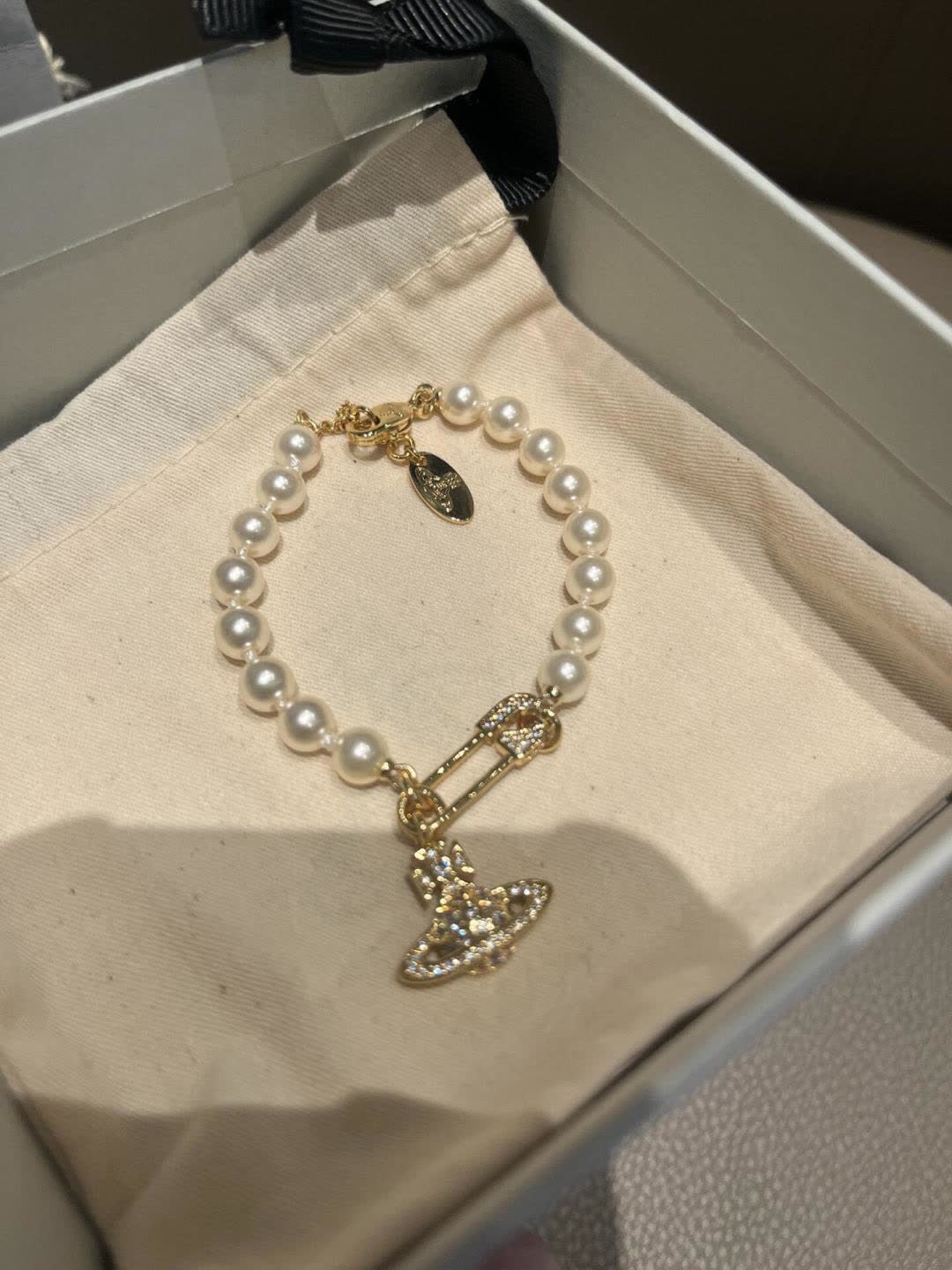 Vivienne Westwood Pearl Bracelet with Orb Charm